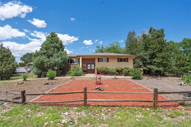 1244 Baron Rd, Colorado Springs, CO 80918 - view of front of house with french doors and brick siding