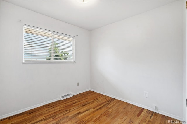 1244 Baron Rd, Colorado Springs, CO 80918 - unfurnished room featuring light wood finished floors and baseboards