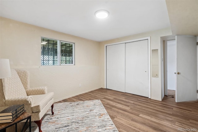 1244 Baron Rd, Colorado Springs, CO 80918 - sitting room featuring wood finished floors and baseboards