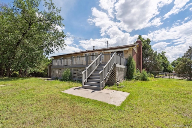 1244 Baron Rd, Colorado Springs, CO 80918 - rear view of house featuring stairway, a chimney, and a wooden deck