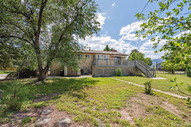 1244 Baron Rd, Colorado Springs, CO 80918 - back of house featuring stairs and a deck