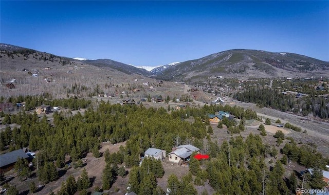 drone / aerial view featuring a mountain view