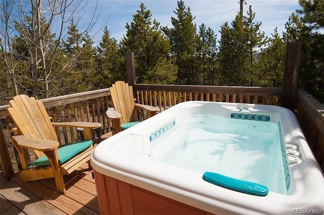 deck with a hot tub