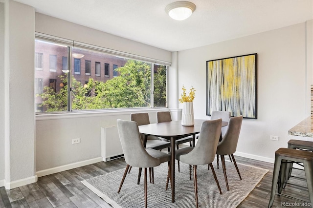 dining room featuring dark hardwood / wood-style floors