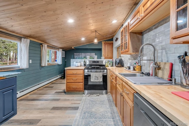 146 Dynamite Dr, Black Hawk, CO 80422 - kitchen featuring stainless steel appliances, a baseboard heating unit, a sink, vaulted ceiling, and wooden ceiling