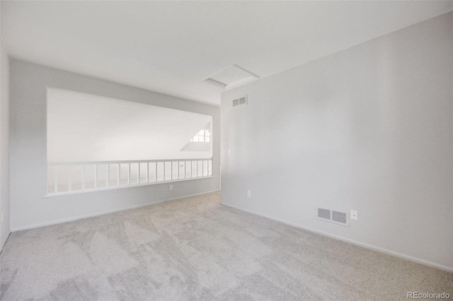 9147 W Rockland Pl, Littleton, CO 80128 - spare room with attic access and carpet floors