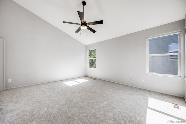 9147 W Rockland Pl, Littleton, CO 80128 - spare room featuring a ceiling fan, carpet, and high vaulted ceiling
