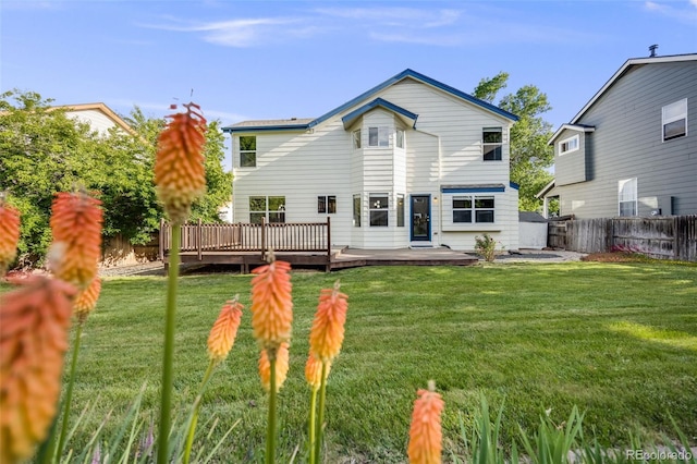 9147 W Rockland Pl, Littleton, CO 80128 - back of house featuring a deck and a fenced backyard
