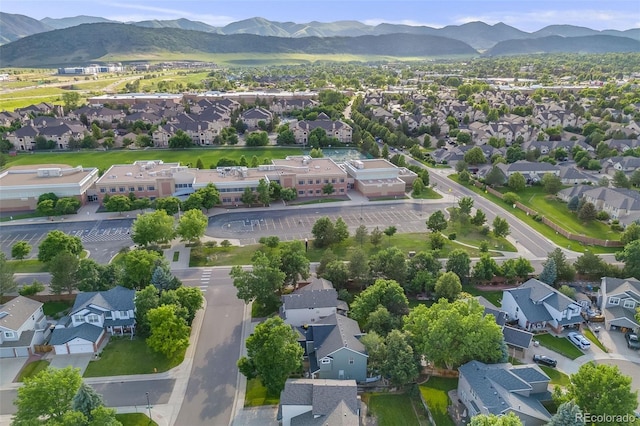 9147 W Rockland Pl, Littleton, CO 80128 - aerial perspective of suburban area with a mountainous background