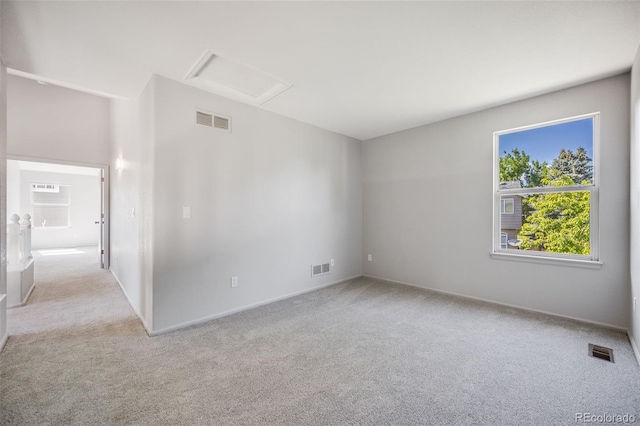 9147 W Rockland Pl, Littleton, CO 80128 - unfurnished room with attic access and carpet
