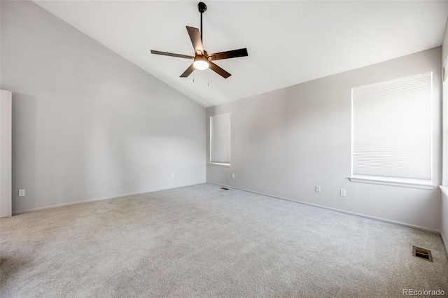 9147 W Rockland Pl, Littleton, CO 80128 - spare room with carpet, a ceiling fan, and vaulted ceiling