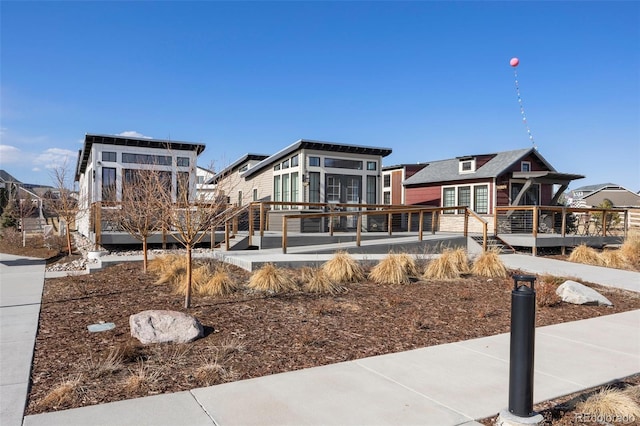 view of playground featuring a deck