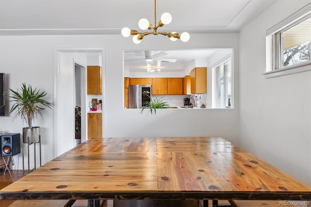 dining space with plenty of natural light