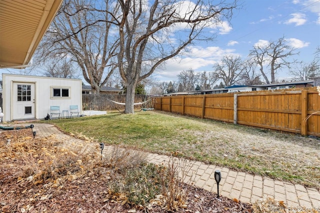 view of yard with a fenced backyard