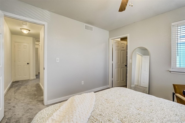 533 Horizon Pl, Dacono, CO 80514 - bedroom with carpet, arched walkways, and ceiling fan