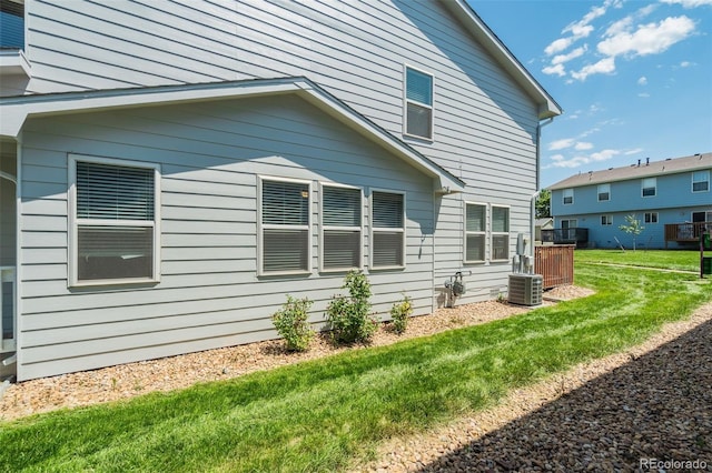 533 Horizon Pl, Dacono, CO 80514 - view of property exterior featuring a yard and a central AC unit