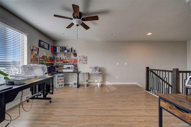 office space with recessed lighting, ceiling fan, baseboards, and wood finished floors