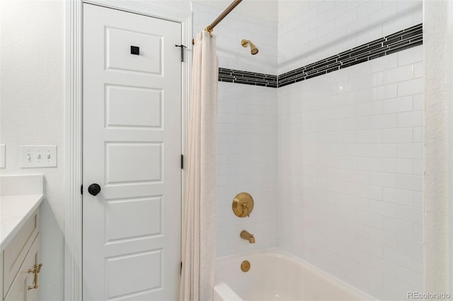 bathroom with vanity and shower / bath combination with curtain
