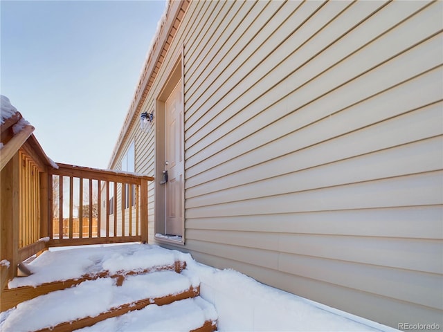 view of snow covered property