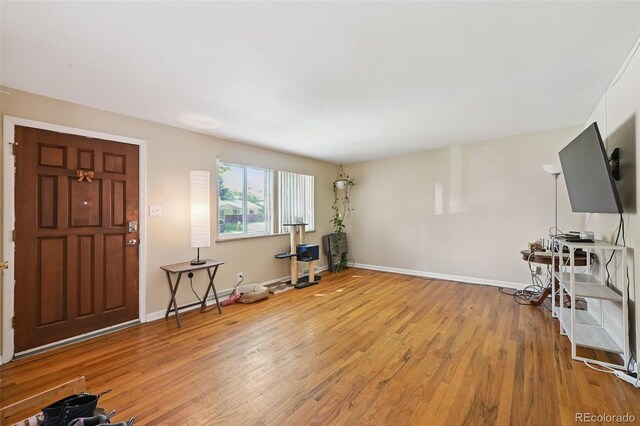 8250 Chase Way, Arvada, CO 80003 - foyer with wood finished floors and baseboards