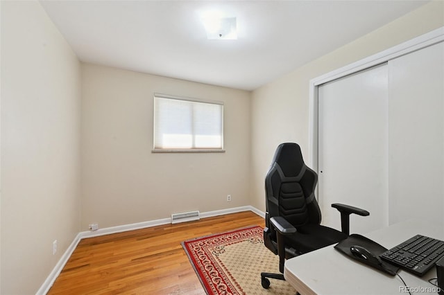 8250 Chase Way, Arvada, CO 80003 - office featuring light wood-style flooring and baseboards