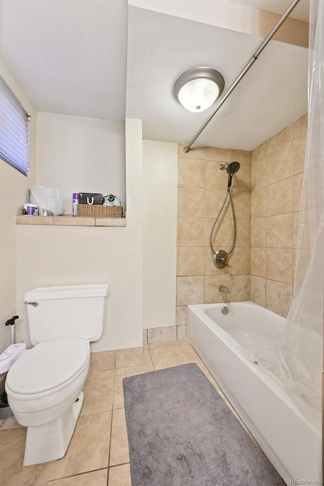 8250 Chase Way, Arvada, CO 80003 - bathroom featuring shower / bathtub combination with curtain and tile patterned flooring