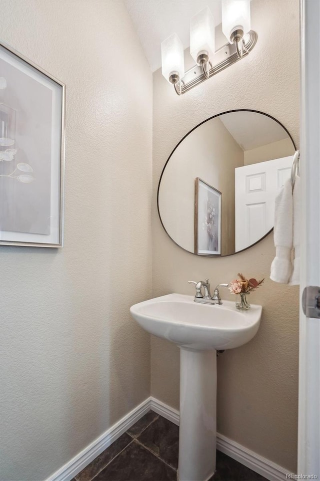 5193 E 119th Way, Thornton, CO 80233 - bathroom featuring tile patterned floors and a sink