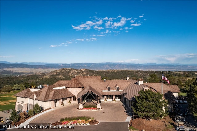 drone / aerial view featuring a mountain view