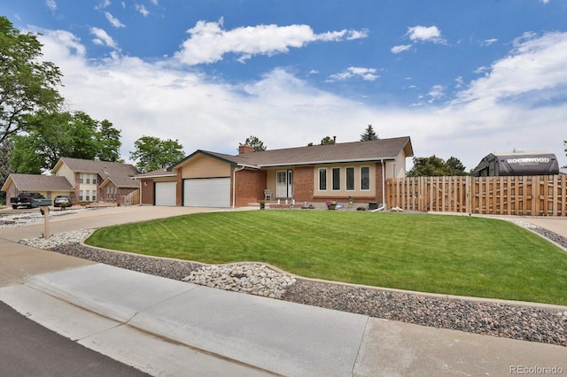 7784 Lewis St, Arvada, CO 80005 - single story home featuring brick siding, concrete driveway, an attached garage, and a chimney