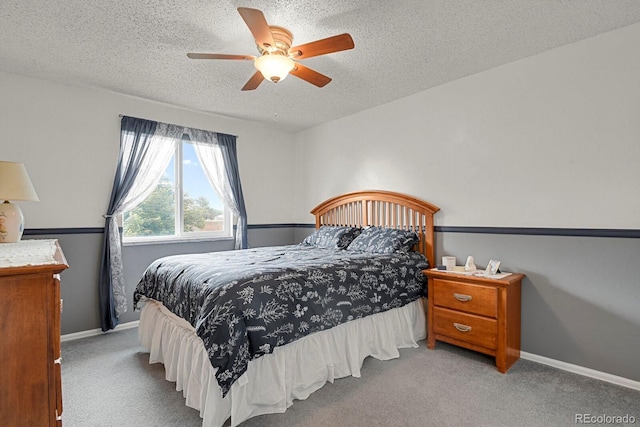 7784 Lewis St, Arvada, CO 80005 - bedroom with carpet, a textured ceiling, and a ceiling fan