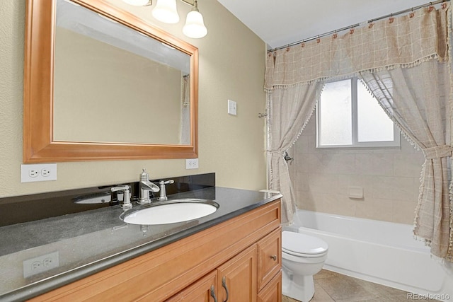 7784 Lewis St, Arvada, CO 80005 - bathroom with vanity, shower / tub combo, and tile patterned flooring