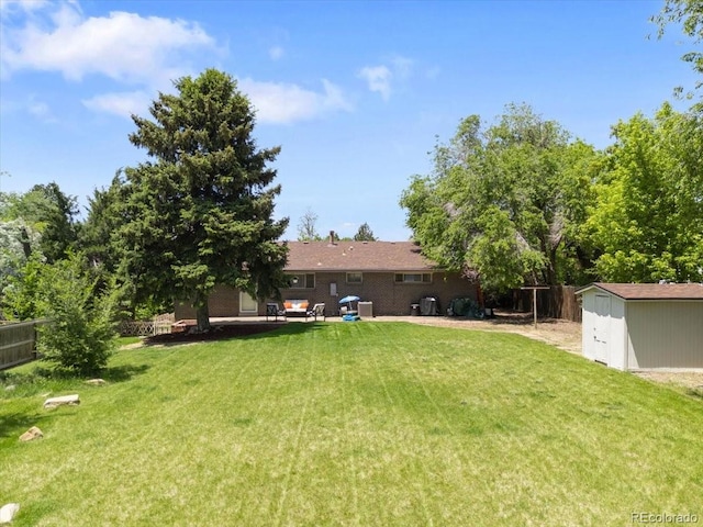 2502 S Lima St, Aurora, CO 80014 - view of yard featuring a storage shed