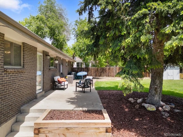 2502 S Lima St, Aurora, CO 80014 - fenced backyard with a patio
