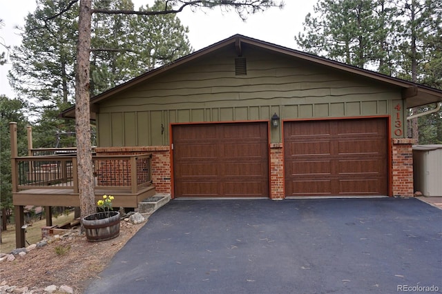 4130 Aspen Ln, Evergreen, CO 80439 - garage with driveway
