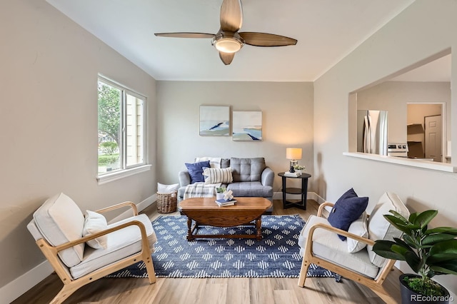 1237 Tamarac St, Denver, CO 80220 - living room with wood finished floors and a ceiling fan