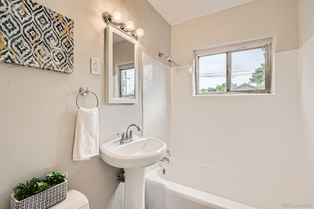 1237 Tamarac St, Denver, CO 80220 - bathroom with tub / shower combination and healthy amount of natural light