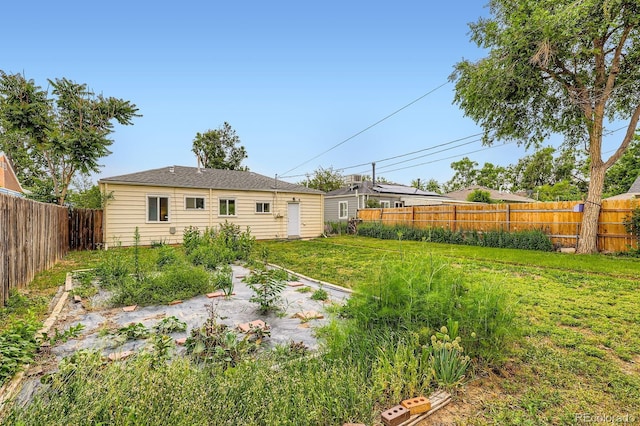 1237 Tamarac St, Denver, CO 80220 - rear view of property featuring a fenced backyard