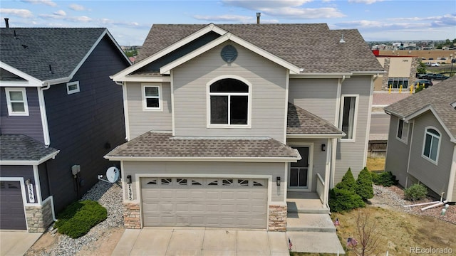 view of front of house with a garage