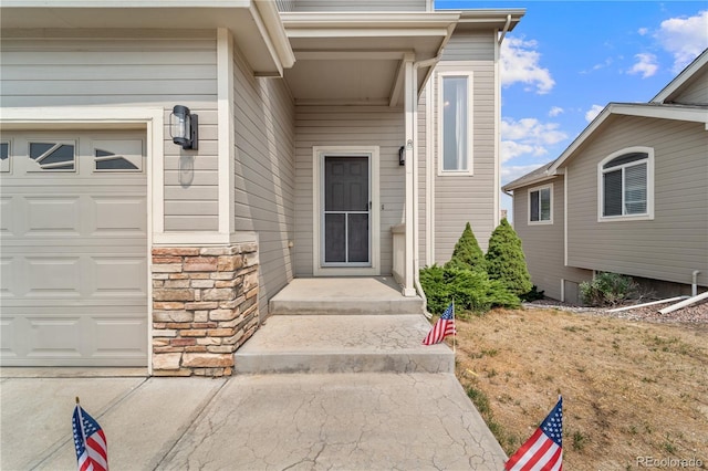 entrance to property with a garage