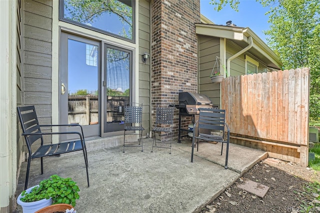 10806 W Evans Ave Unit 5, Lakewood, CO 80227 - view of patio / terrace with a grill