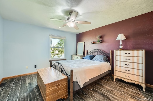 10806 W Evans Ave Unit 5, Lakewood, CO 80227 - bedroom featuring dark wood finished floors, baseboards, a ceiling fan, and a textured ceiling