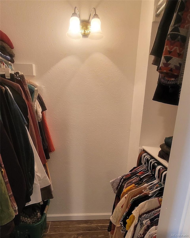 10806 W Evans Ave Unit 5, Lakewood, CO 80227 - walk in closet featuring dark wood finished floors