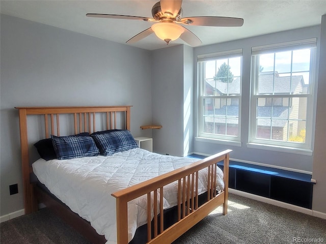 10806 W Evans Ave Unit 5, Lakewood, CO 80227 - carpeted bedroom featuring ceiling fan and baseboards