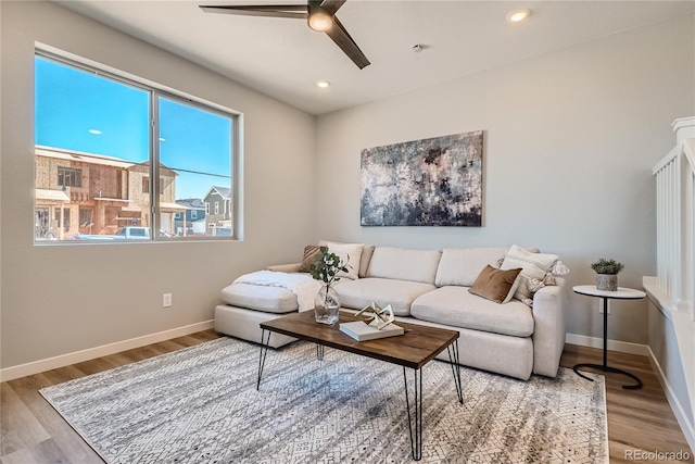 95 N Vandriver Pl, Aurora, CO 80018 - living room featuring a ceiling fan, wood finished floors, baseboards, and recessed lighting
