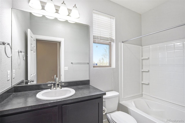 4873 Cathay Ct, Denver, CO 80249 - bathroom with toilet, bathing tub / shower combination, vanity, and a textured wall