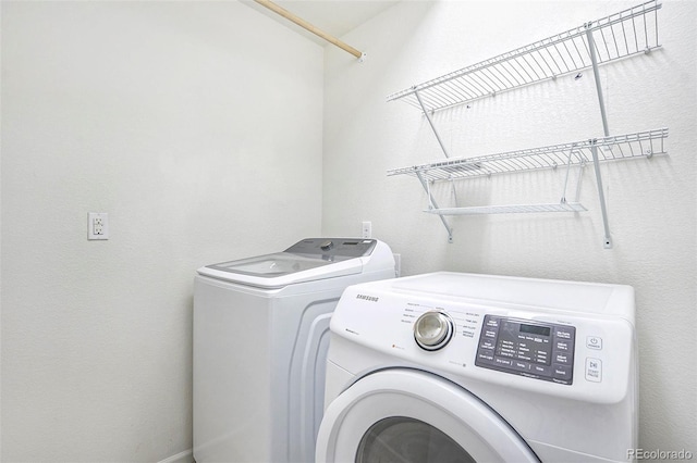 4873 Cathay Ct, Denver, CO 80249 - washroom featuring washer and clothes dryer and laundry area