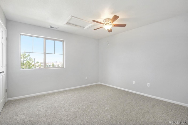4873 Cathay Ct, Denver, CO 80249 - carpeted spare room with attic access, baseboards, and a ceiling fan