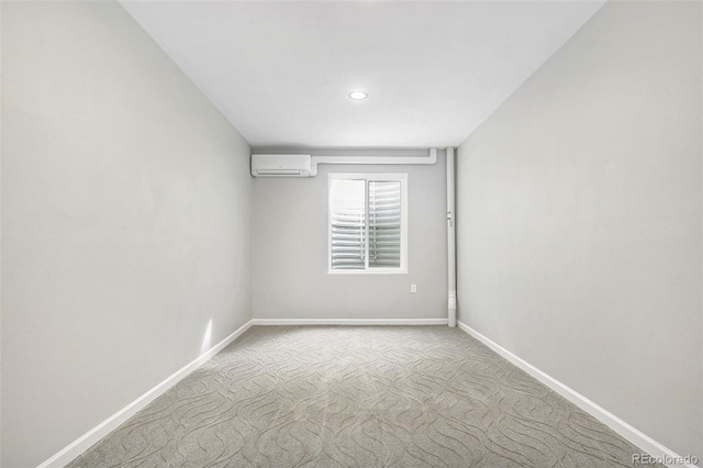 4873 Cathay Ct, Denver, CO 80249 - unfurnished room featuring carpet, baseboards, a wall unit AC, and recessed lighting