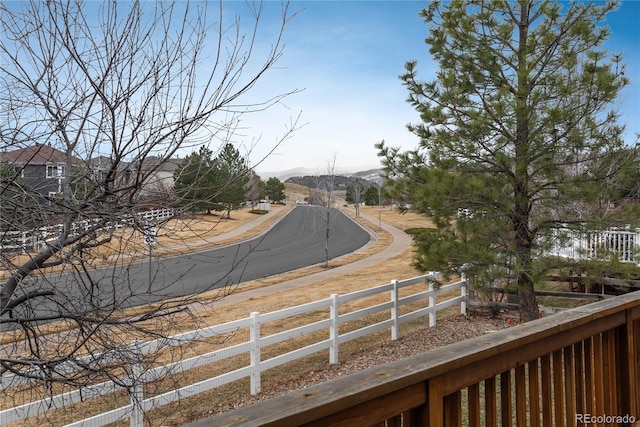 exterior space with sidewalks and a mountain view