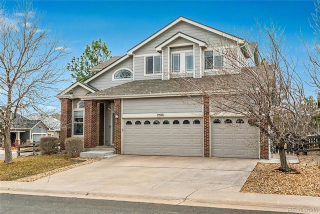 view of front of property with driveway, brick siding, a shingled roof, and a garage